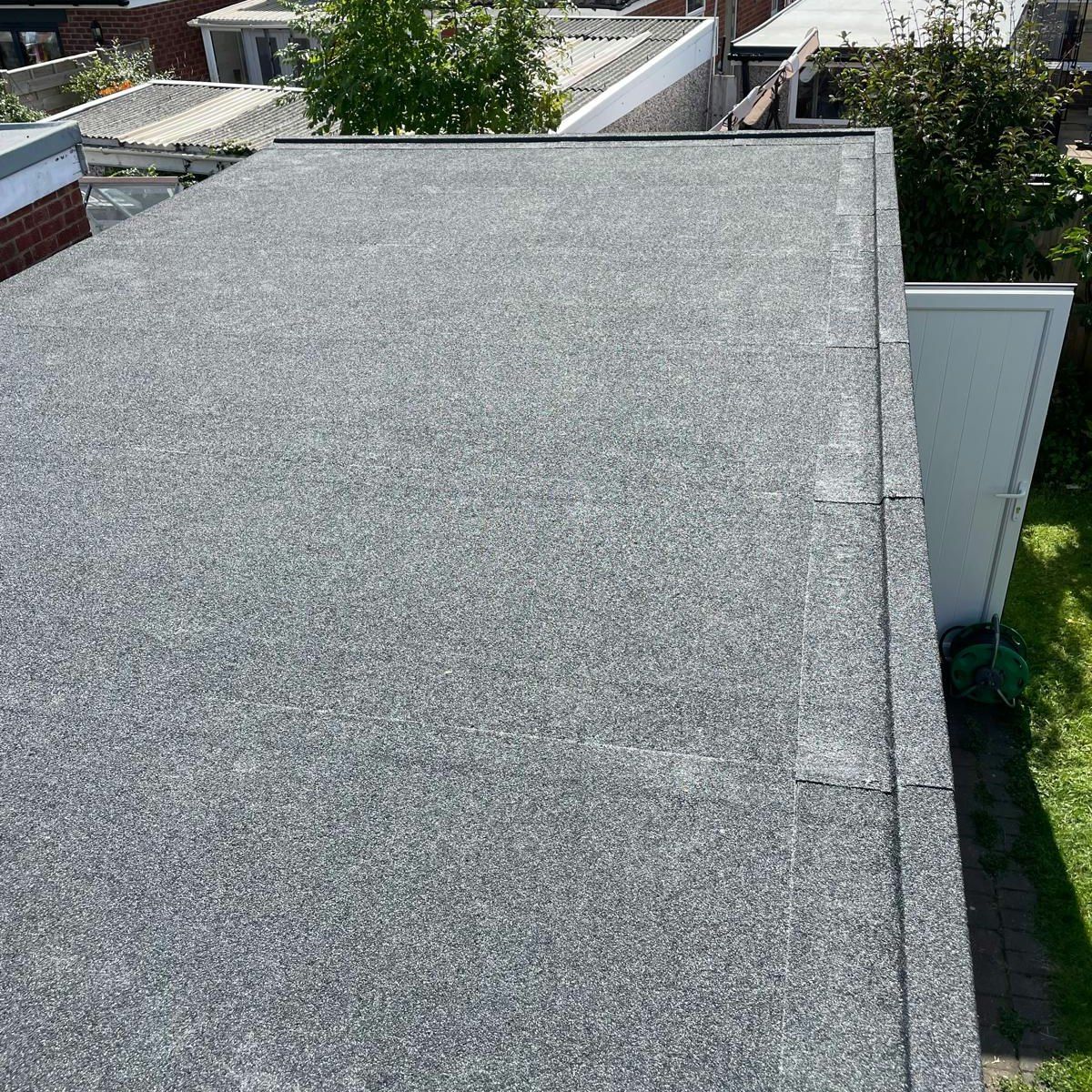 Mineral felt flat roof over a single-storey extension