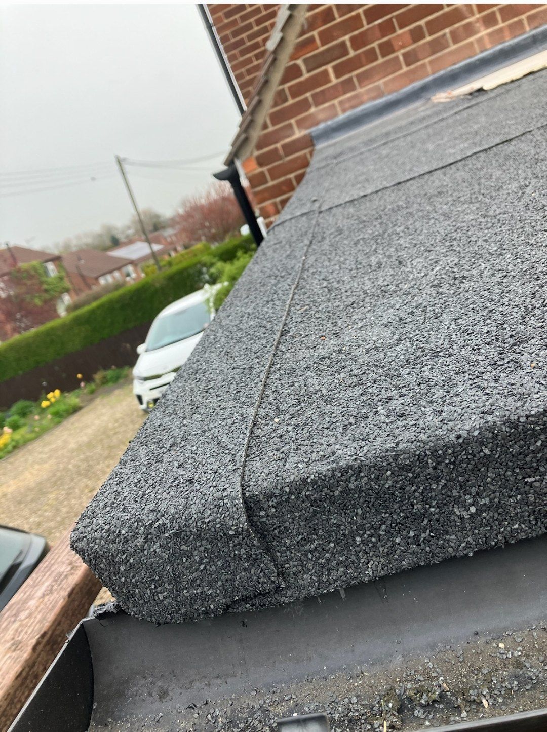 Edge of a mineral felt flat roof