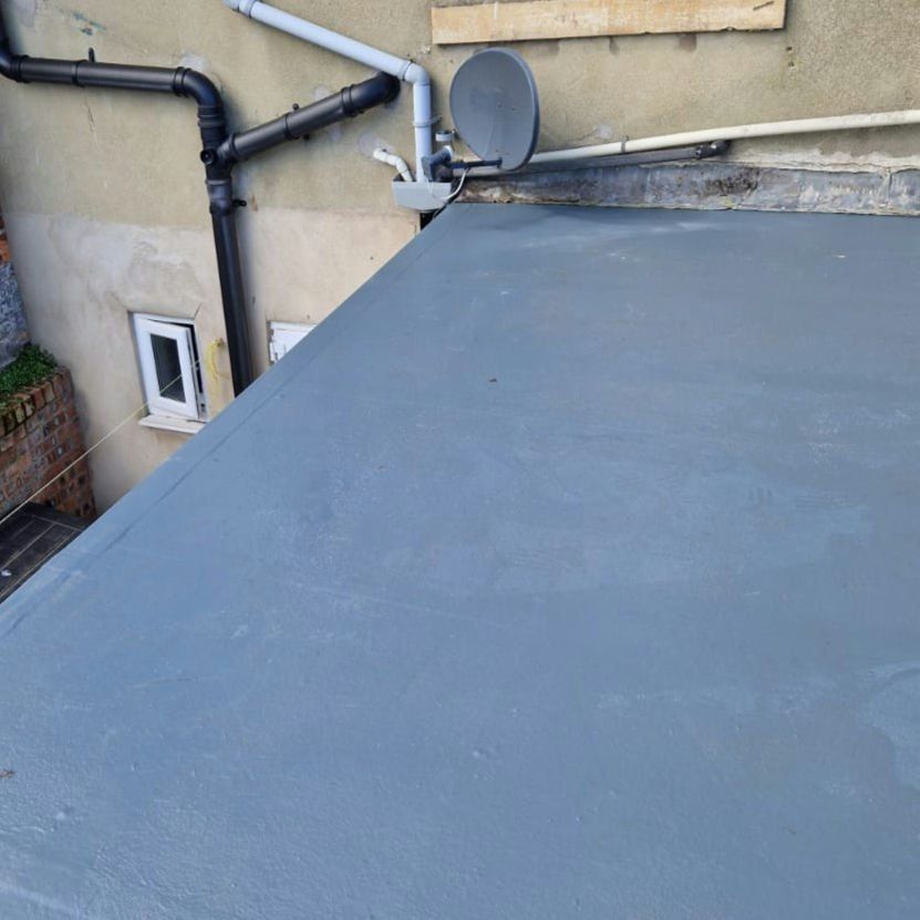 Grey flat roof on a rear extension