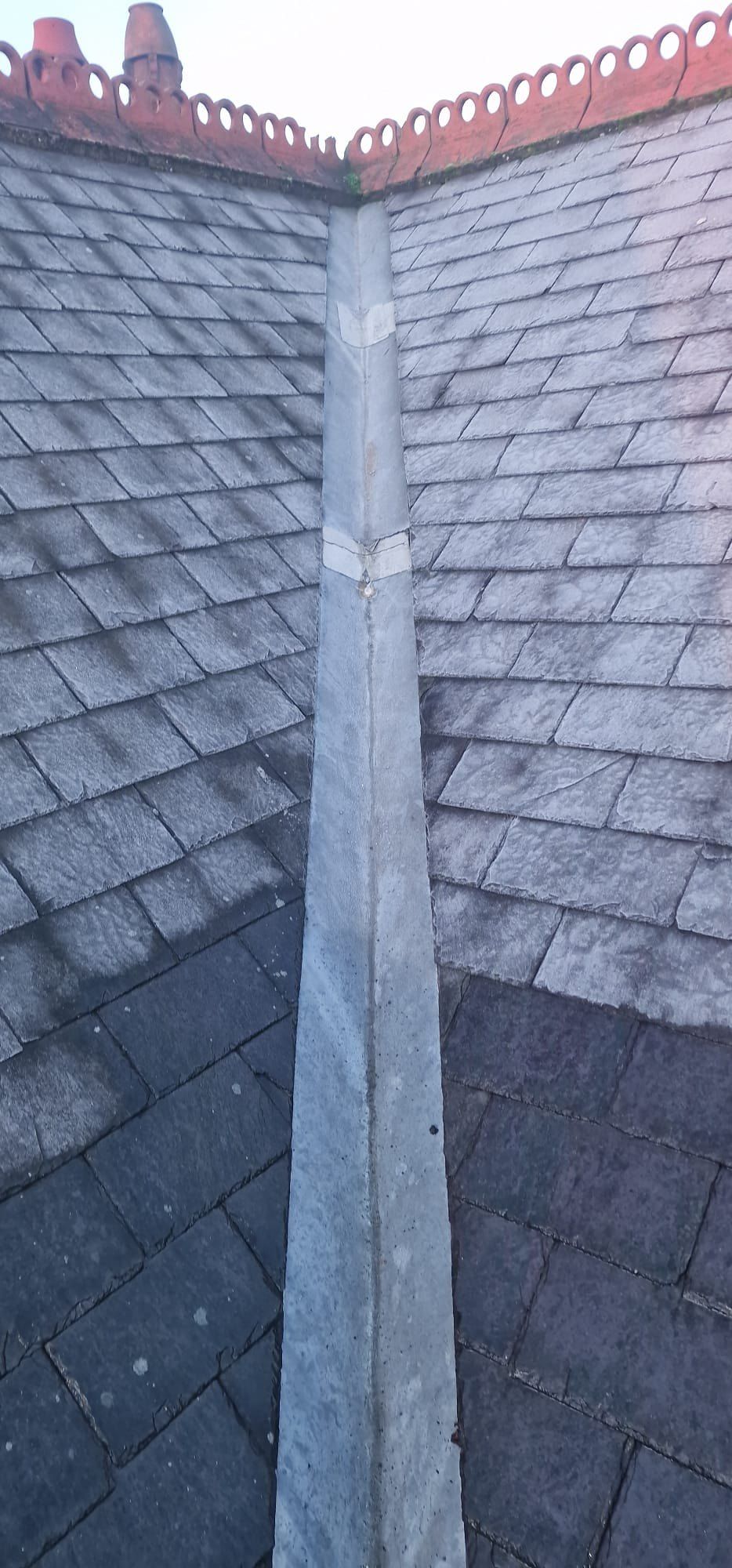 Lead-lined valley between two slate roof slopes